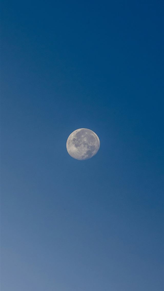 1290x2796 a full moon in a clear blue sky - maldives iPhone Wallpaper