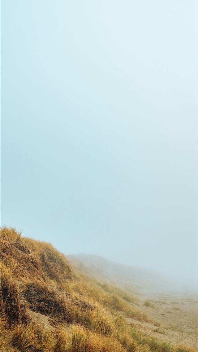 1290x2796 mountains under cloudy sky -  iPhone Wallpaper