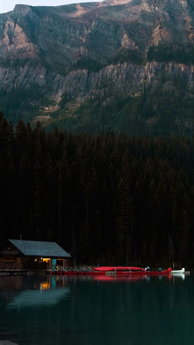 1290x2796 a lake with a mountain in the background -  iPhone Wallpaper