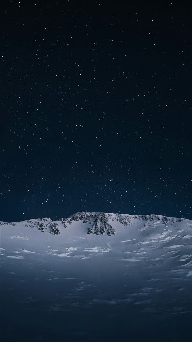 1290x2796 Snowy mountains under a starry night sky -  iPhone Wallpaper