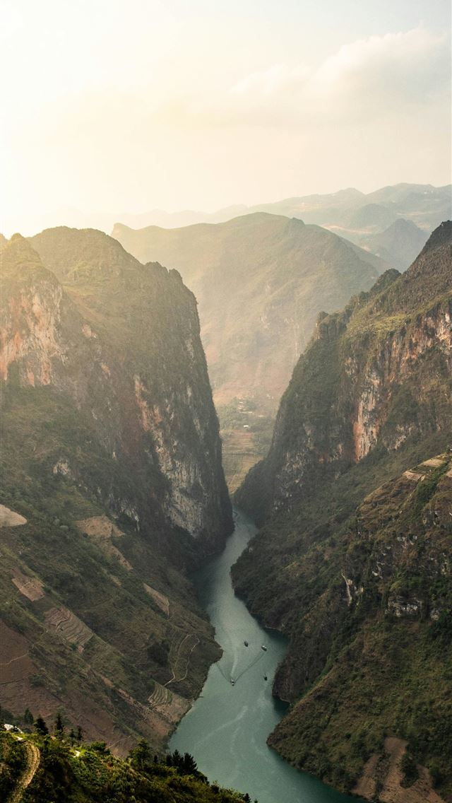 1290x2796 a river in a valley surrounded by mountains - sunset iPhone Wallpaper