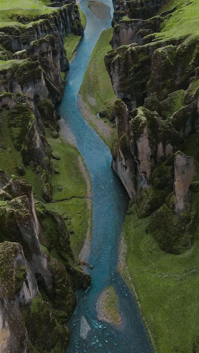 1290x2796 river in the middle of green grass covered hill -  iPhone Wallpaper
