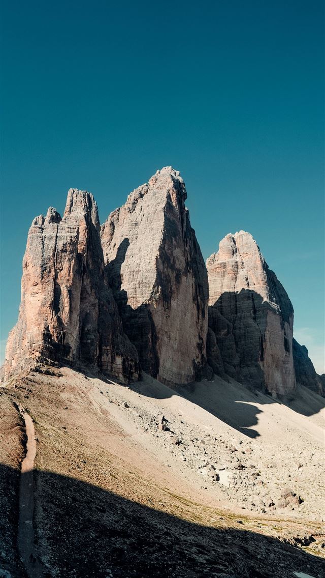 1290x2796 a rocky mountain range with a trail going through ... -  iPhone Wallpaper