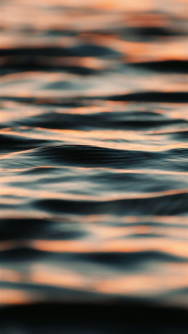 1290x2796 Gentle waves reflecting warm sunset light - sunset iPhone Wallpaper