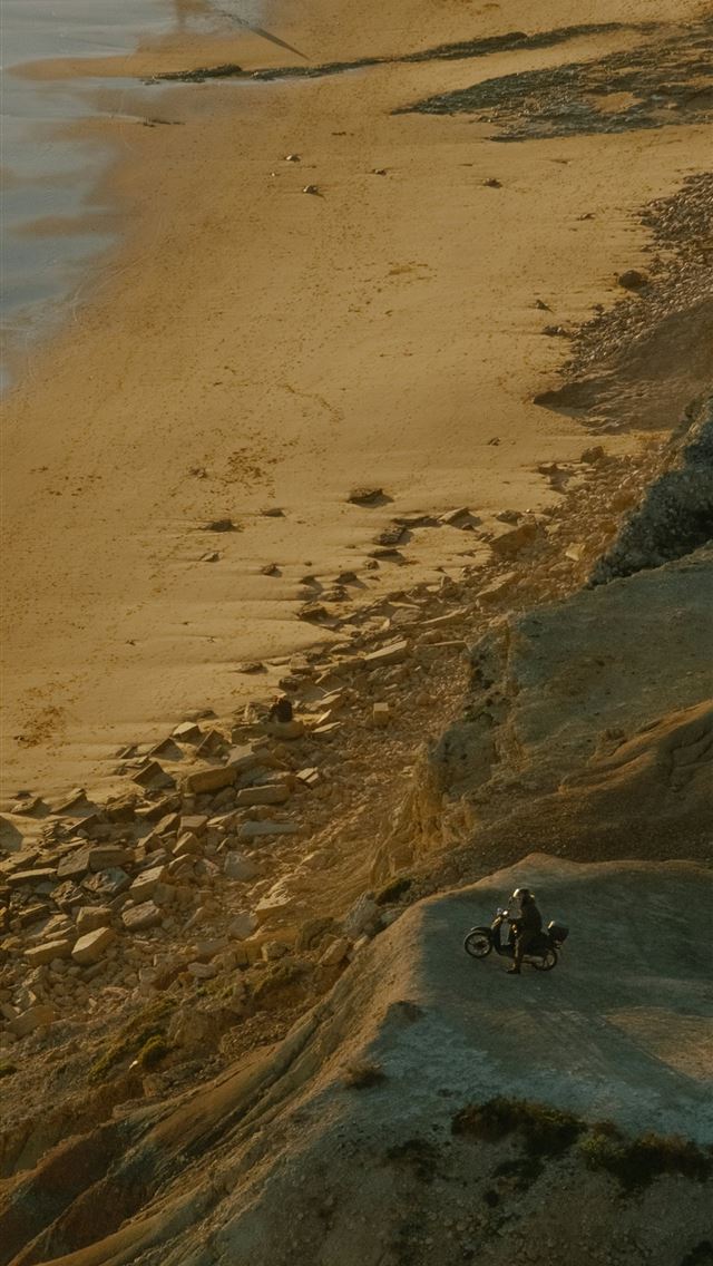 1290x2796 a person riding a motorcycle on a sandy beach - beach iPhone Wallpaper