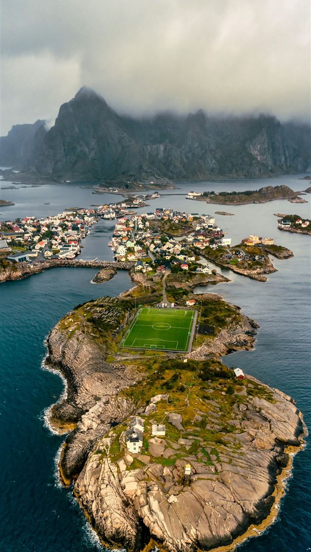1290x2796 an aerial view of a small island in the middle of ... - football iPhone Wallpaper