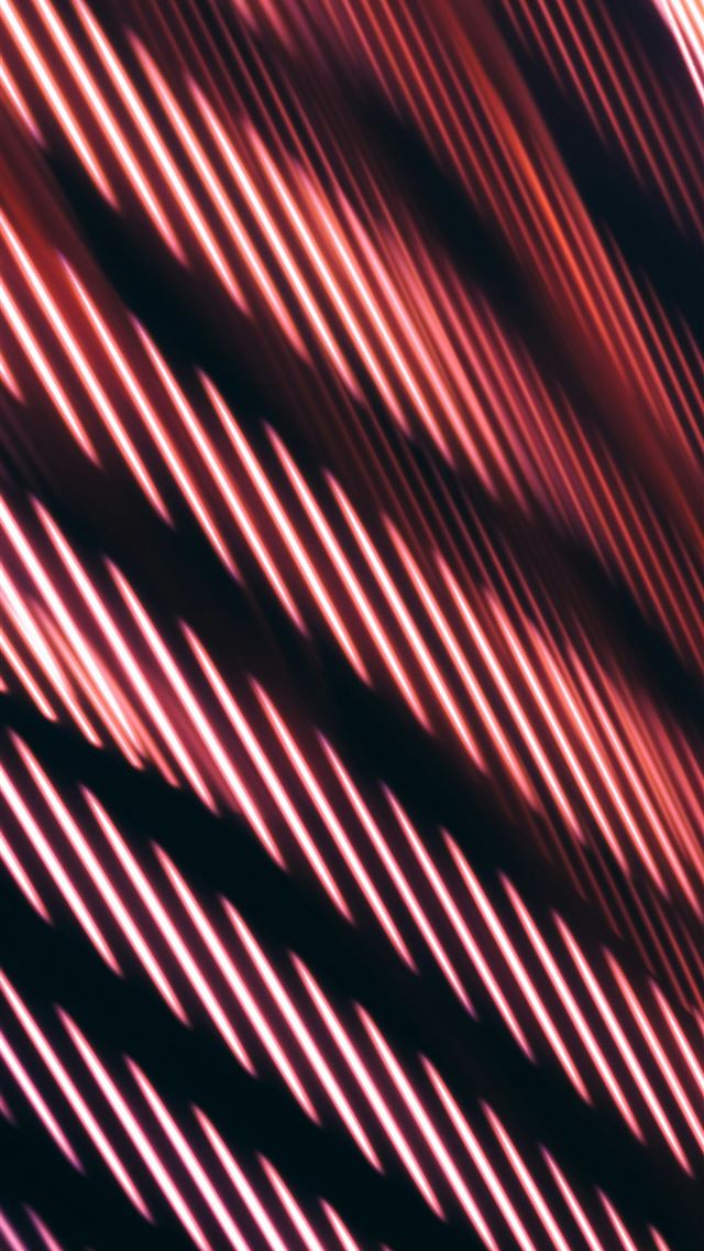 1290x2796 a blurry image of a red and black background -  iPhone Wallpaper