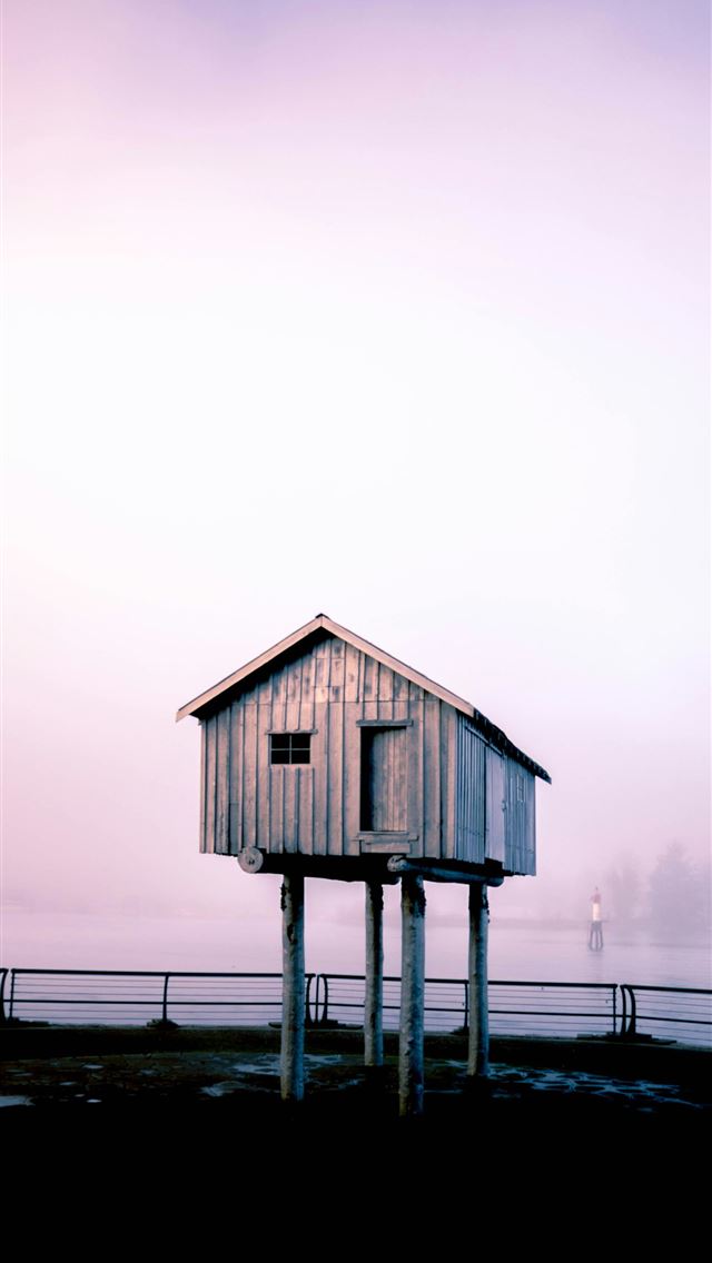 1290x2796 gray wooden storage shed under gray sky -  iPhone Wallpaper