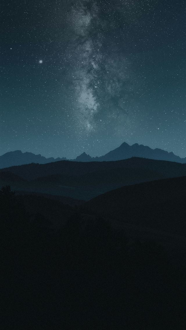 1290x2796 Milky way galaxy over silhouetted mountains at nig... - stars iPhone Wallpaper