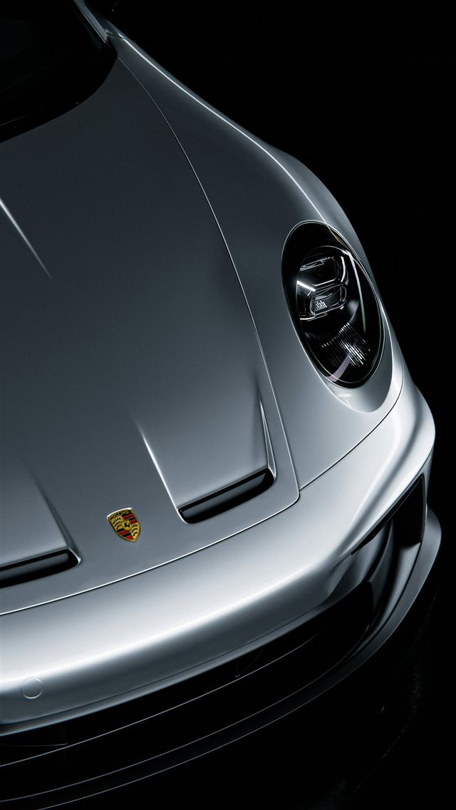 1290x2796 a close up of a silver sports car -  iPhone Wallpaper