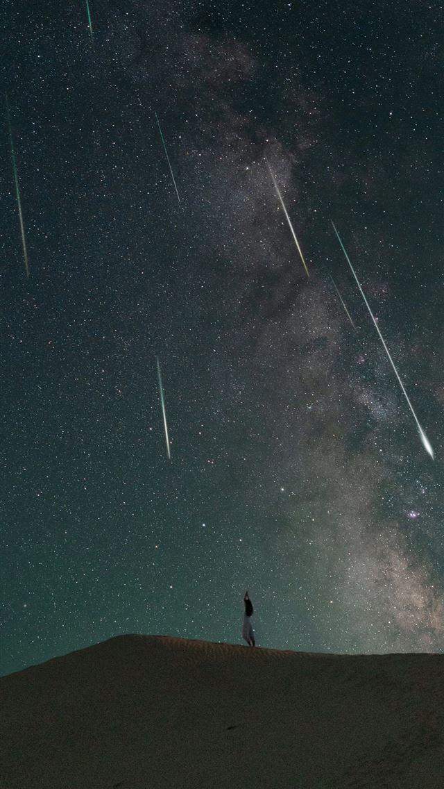 1290x2796 a person standing on top of a hill under a night s... -  iPhone Wallpaper