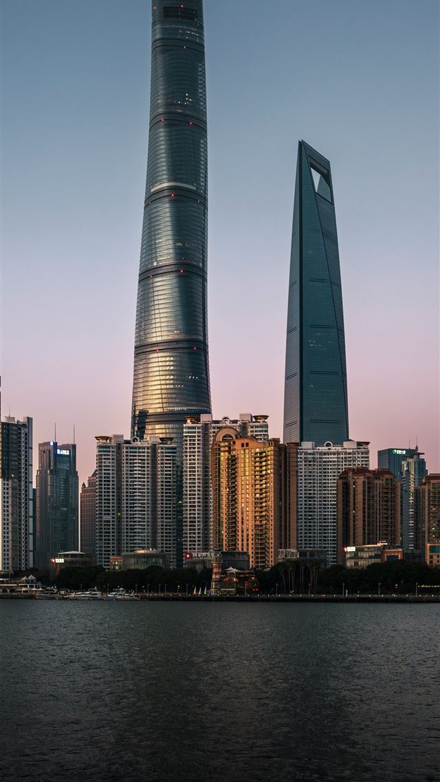 1290x2796 a large body of water with a city in the backgroun... -  iPhone Wallpaper