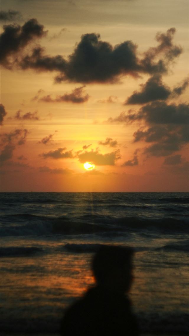 1290x2796 Silhouette of person watching sunset over the ocea... - waves iPhone Wallpaper
