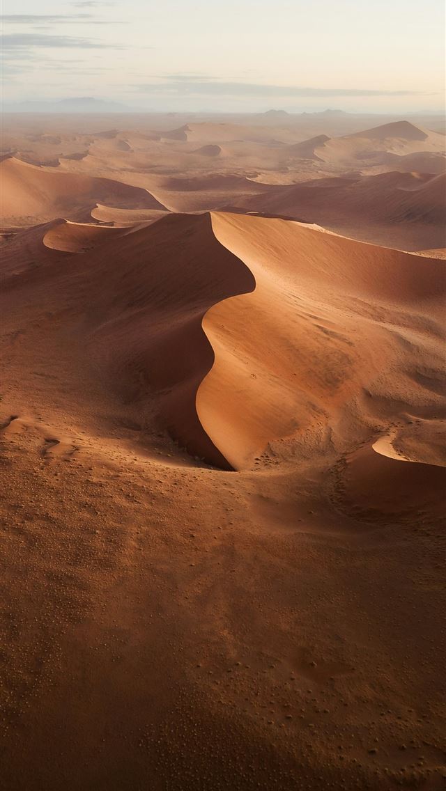 1290x2796 a view of a desert with sand dunes -  iPhone Wallpaper