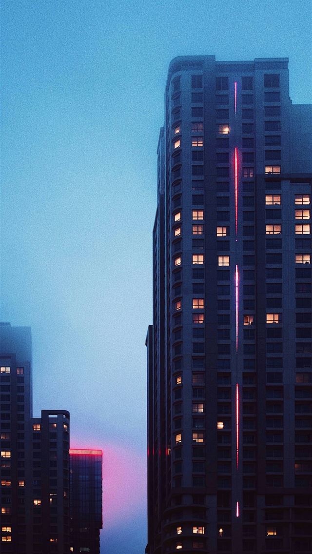 640x1136 a very tall building in the middle of a city -  iPhone Wallpaper