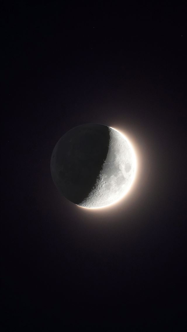 1290x2796 the moon is seen in front of a black background -  iPhone Wallpaper