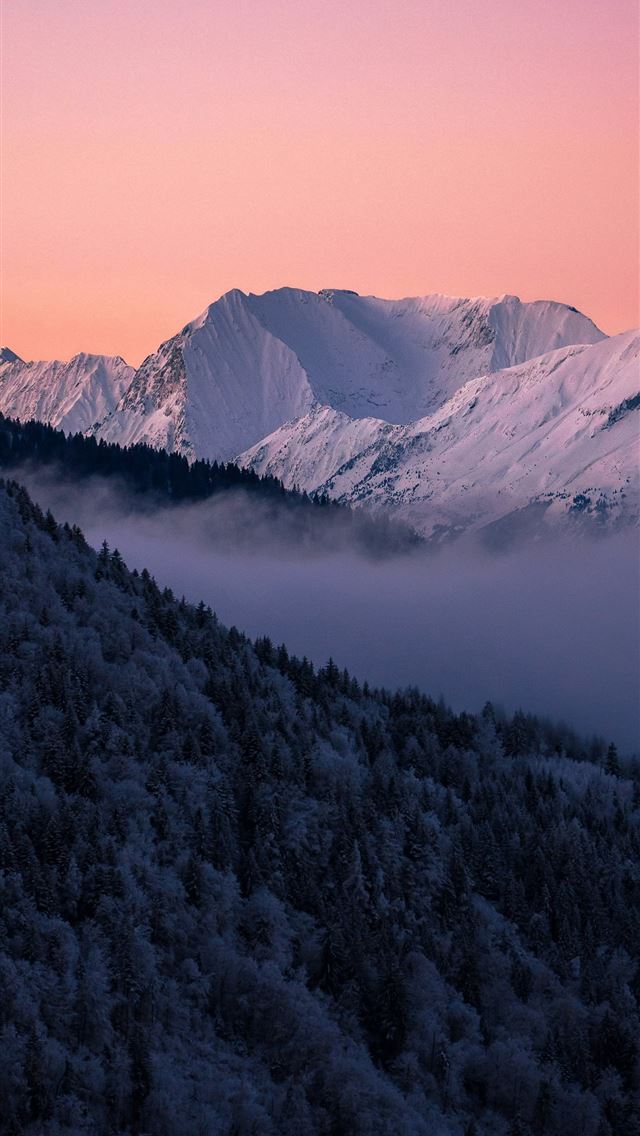 1290x2796 a mountain covered in snow with a pink sky -  iPhone Wallpaper