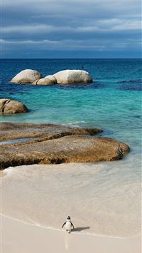 rocks on body of water during daytime wallpaper