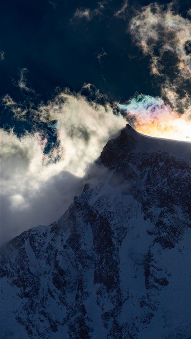 1290x2796 a large mountain covered in snow under a cloudy sk... - sunset iPhone Wallpaper