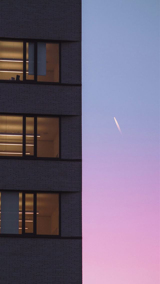 1290x2796 brown concrete building under blue sky during dayt... -  iPhone Wallpaper