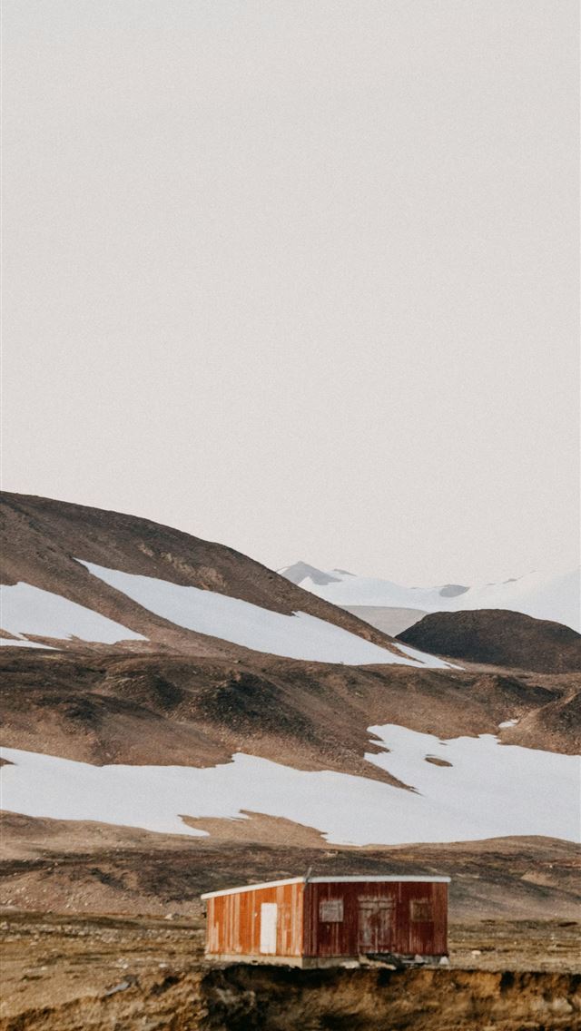 1290x2796 brown wooden house on brown field near snow covere... -  iPhone Wallpaper