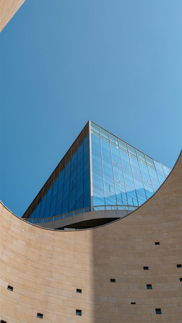 1290x2796 a building with a glass roof -  iPhone Wallpaper