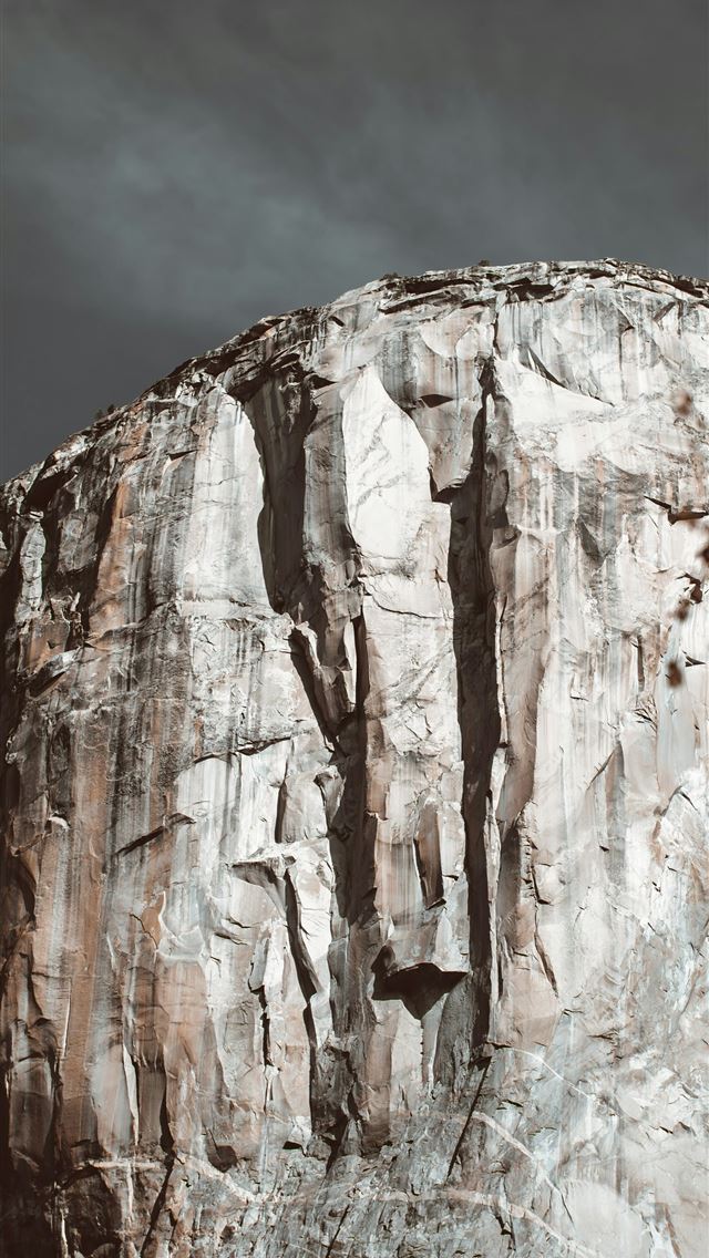 1290x2796 brown rocky mountain under cloudy sky during dayti... -  iPhone Wallpaper