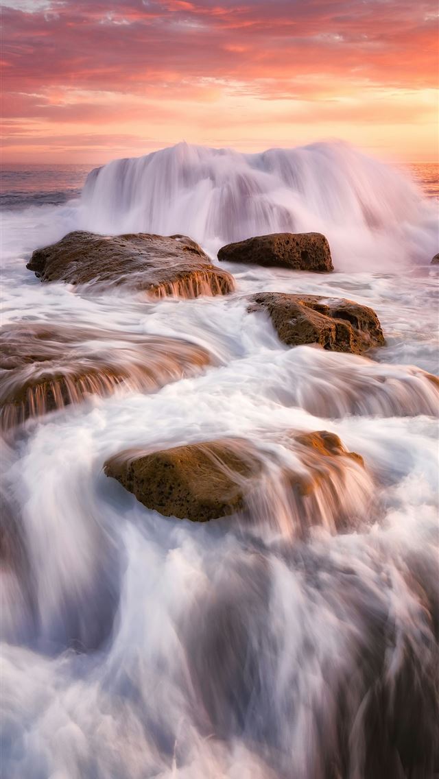 1290x2796 Waves crashing over rocks at sunset -  iPhone Wallpaper