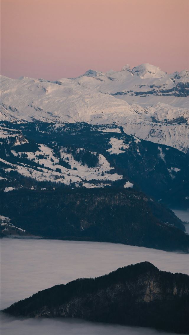 1290x2796 a view of a mountain range covered in snow -  iPhone Wallpaper