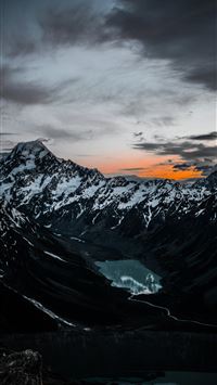 snow covered mountain under sunset wallpaper