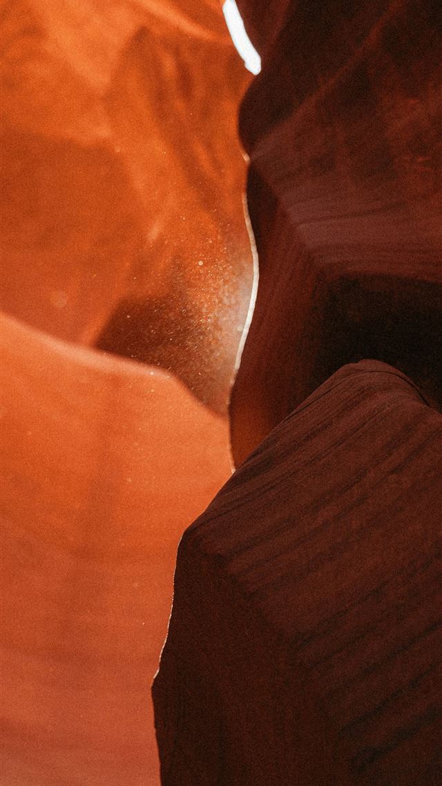 1290x2796 Sunlight streams through a narrow sandstone canyon... -  iPhone Wallpaper