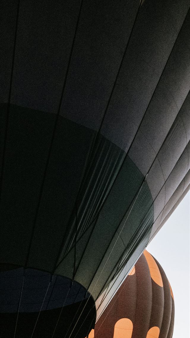 1290x2796 a close up of a building - airplane iPhone Wallpaper