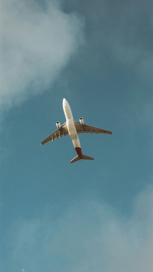 1290x2796 white airliner in sky -  iPhone Wallpaper