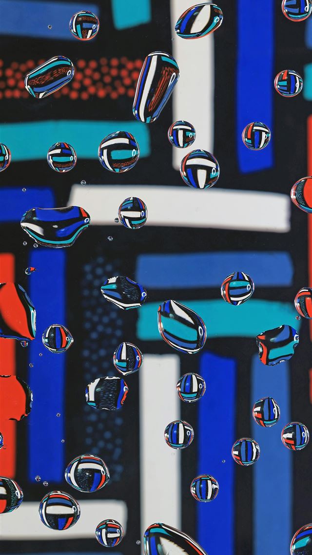 640x1136 a close up of water droplets on a black background -  iPhone Wallpaper