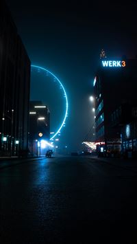 city buildings with lights during night time wallpaper