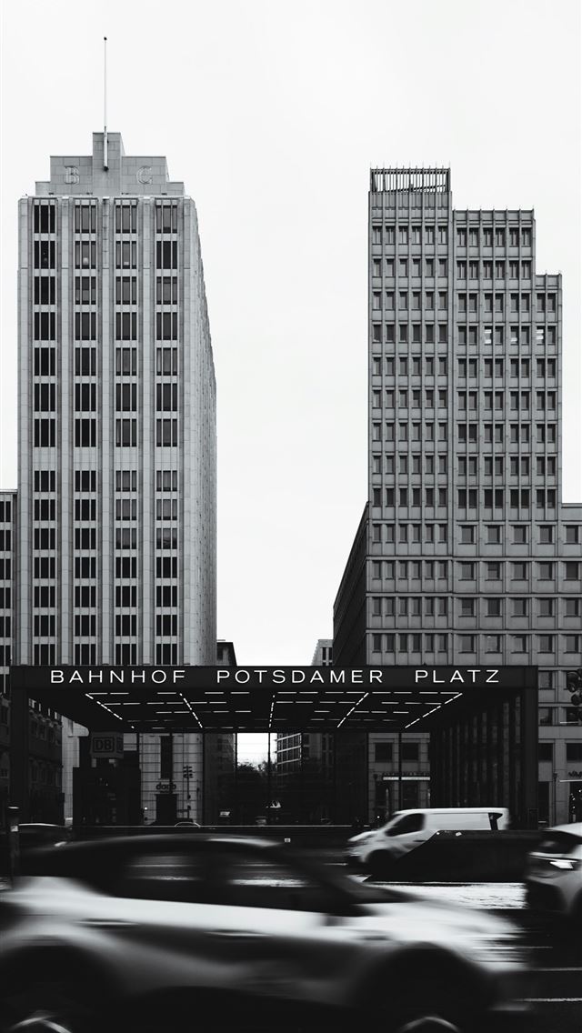 1290x2796 a black and white photo of a city with tall buildi... -  iPhone Wallpaper