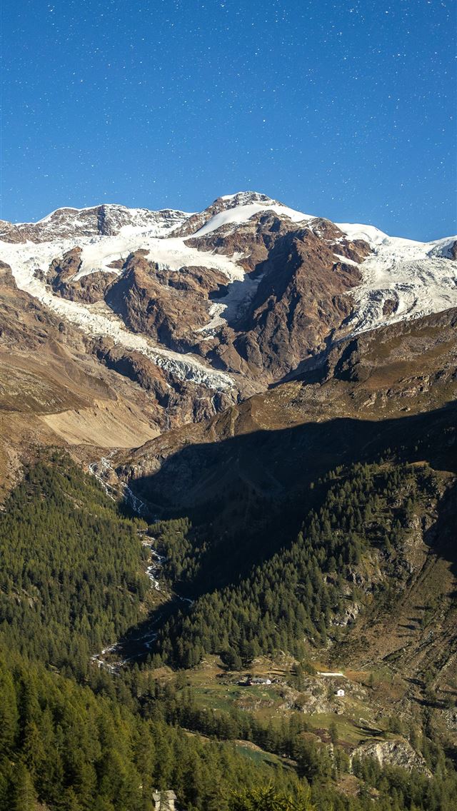 1290x2796 a view of a mountain range with snow on the top -  iPhone Wallpaper
