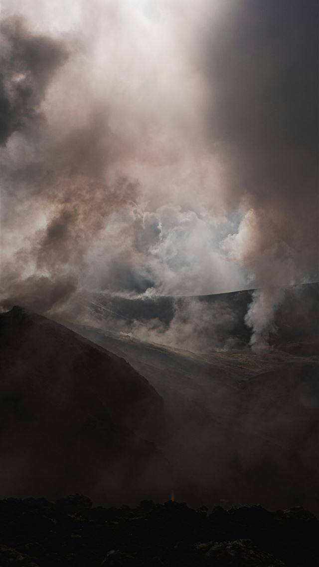 1290x2796 a black and white photo of smoke coming out of a m... - volcano iPhone Wallpaper