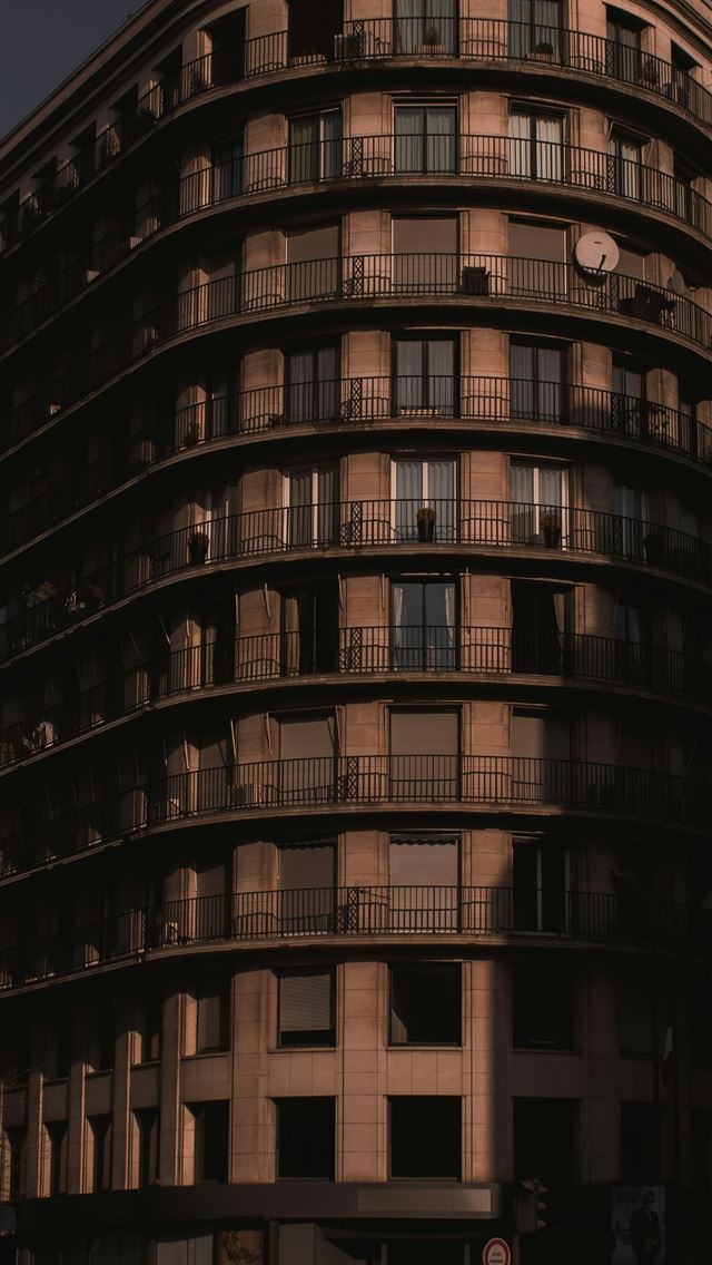 1290x2796 a tall building with balconies and balconies on th... -  iPhone Wallpaper