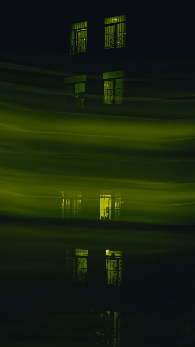 1290x2796 a building with a reflection of it in the water -  iPhone Wallpaper