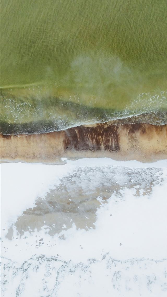 1290x2796 Aerial view of a sandy beach with ocean waves -  iPhone Wallpaper