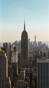 a view of a city with tall buildings wallpaper