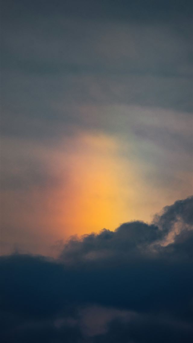 1290x2796 Dramatic sunset sky with dark clouds and glowing o... -  iPhone Wallpaper