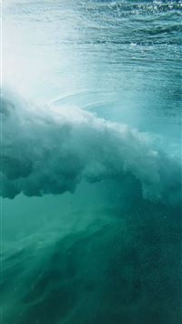 Underwater view of a breaking ocean wave wallpaper
