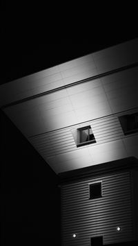 Abstract geometric shapes with dramatic lighting wallpaper