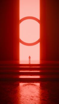 A silhouette stands before a red circular portal  wallpaper