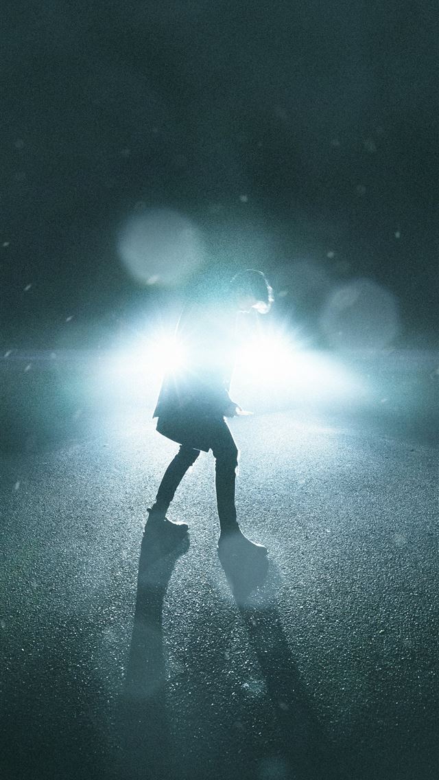 1290x2796 silhouette of man standing under blue and white li... -  iPhone Wallpaper