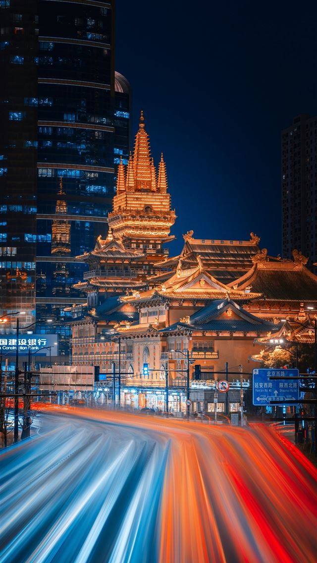 1290x2796 Cityscape at night with light trails and illuminat... -  iPhone Wallpaper
