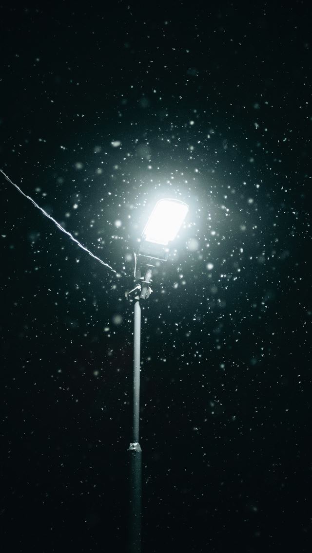 1290x2796 A street light in the dark with snow falling on it - snow iPhone Wallpaper