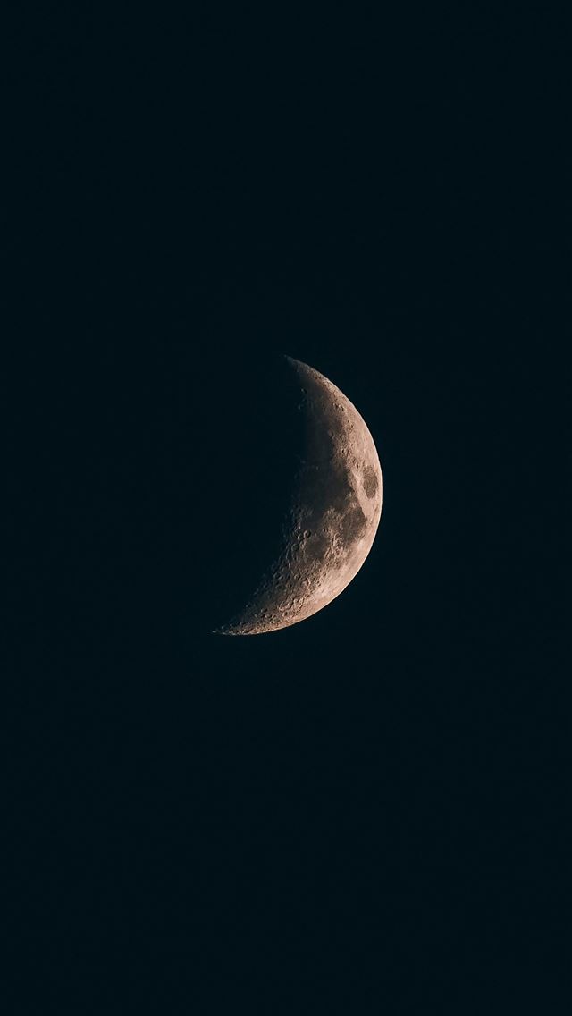 1290x2796 A half moon is seen in the dark sky -  iPhone Wallpaper